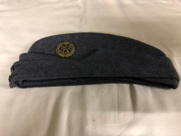 AN RAF AIRMANS SIDE CAP WITH BADGE AND PLASTIC BUTTONS